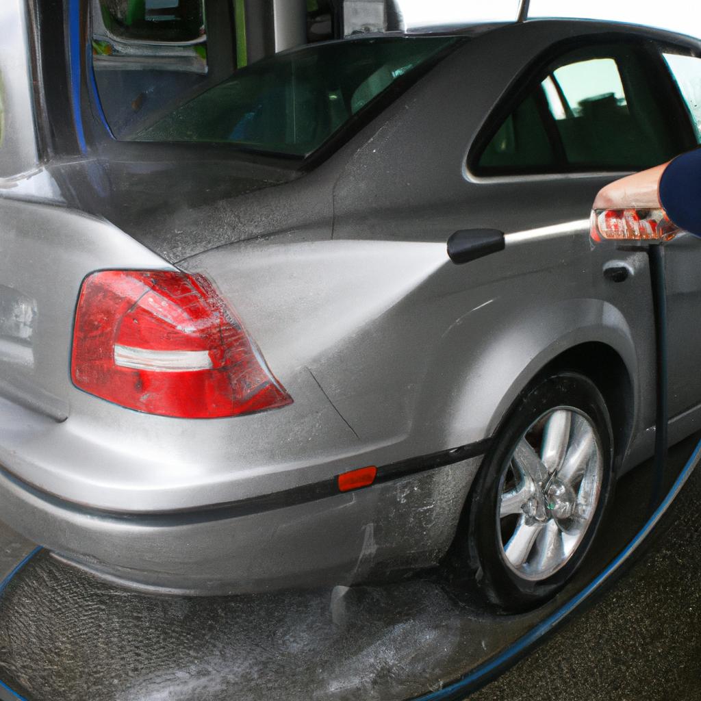 Person using self-serve car wash